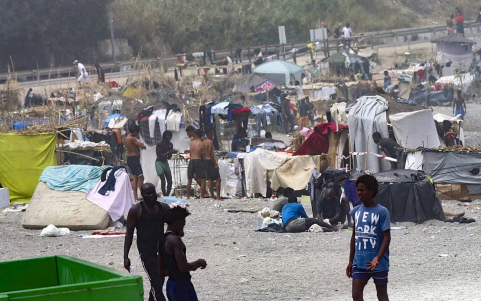 In Spain's Ceuta, hundreds of migrants stage protest and demand asylum